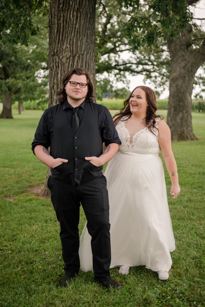 Jesse & Paige McEachran Homestead Winery outdoor wedding first look by Tina Captures Photography