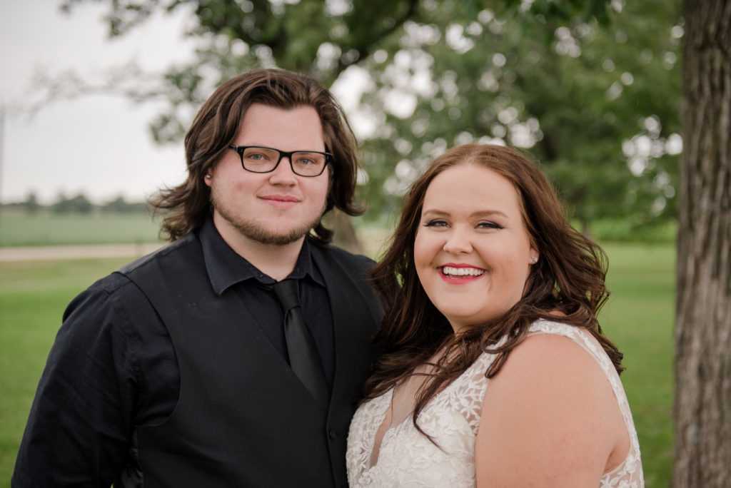 Jesse & Paige McEachran Homestead Winery outdoor wedding bride and groom by Tina Captures Photography