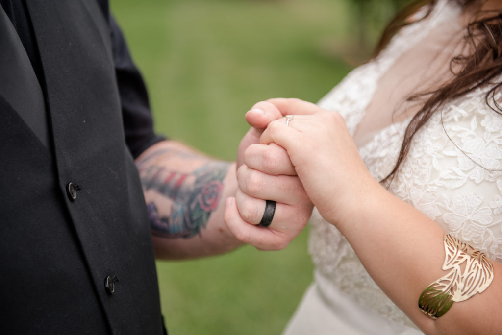 Jesse & Paige McEachran Homestead Winery outdoor wedding bride and groom by Tina Captures Photography