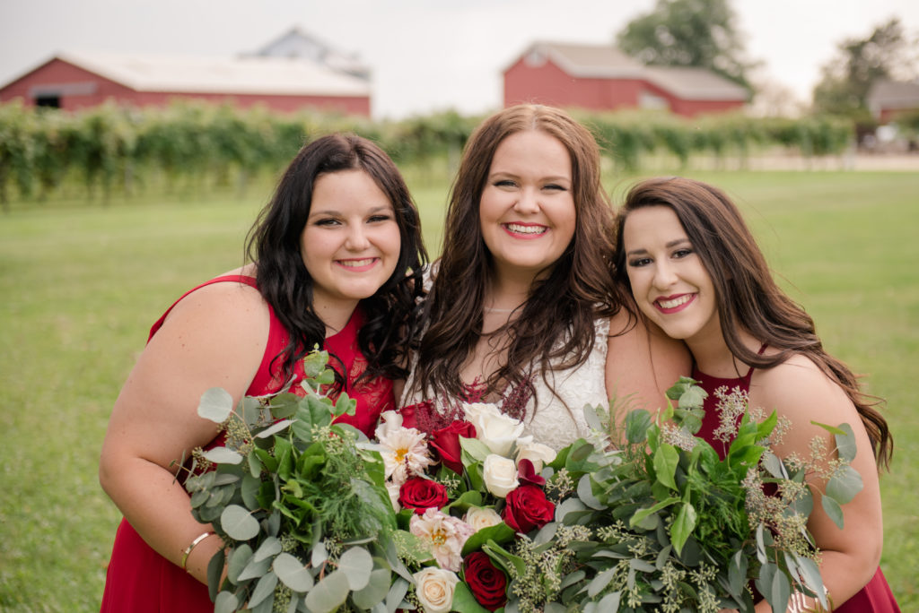 Jesse & Paige McEachran Homestead Winery outdoor wedding maid of honors by Tina Captures Photography