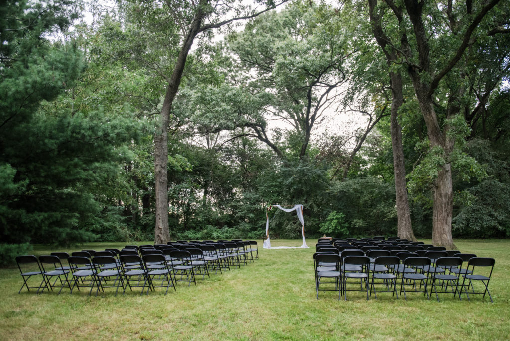 Jesse & Paige McEachran Homestead Winery outdoor wedding ceremony venue by Tina Captures Photography