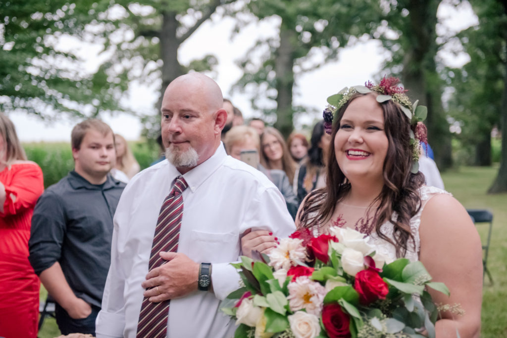 Jesse & Paige McEachran Homestead Winery outdoor wedding ceremony venue bride and father of the groom by Tina Captures Photography