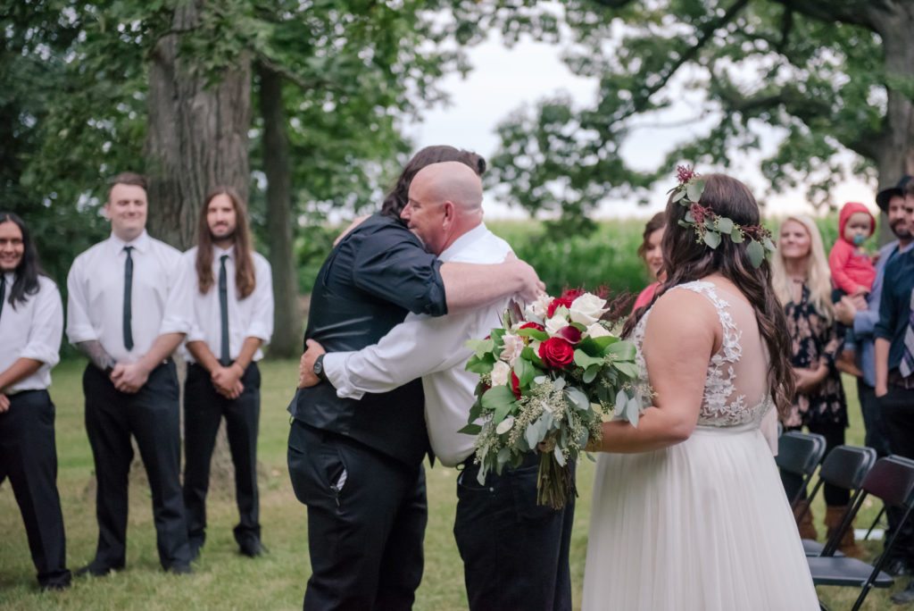 Jesse & Paige McEachran Homestead Winery outdoor wedding ceremony venue by Tina Captures Photography