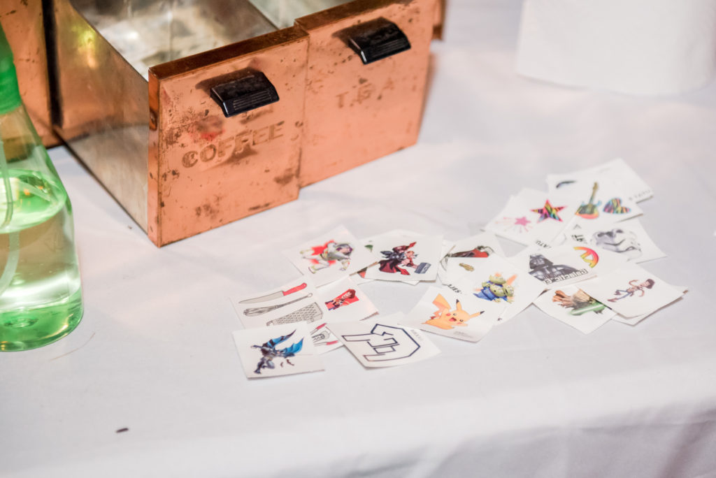 Jesse & Paige McEachran Homestead Winery outdoor wedding temporary tattoo bar station by Tina Captures Photography